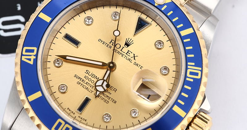 Rolex Submariner 16613 Champagne Serti Dial Blue Bezel