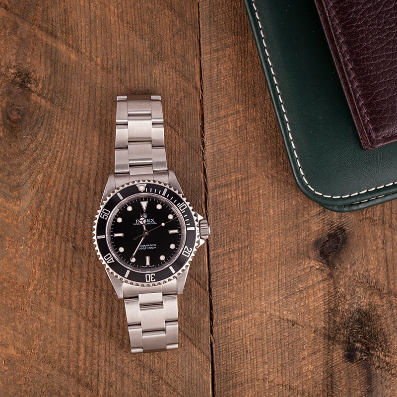 Pre Owned Steel Rolex Submariner 14060M Black Dial