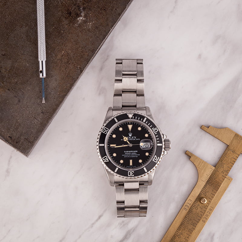 Preowned Rolex Submariner Steel Date 168000