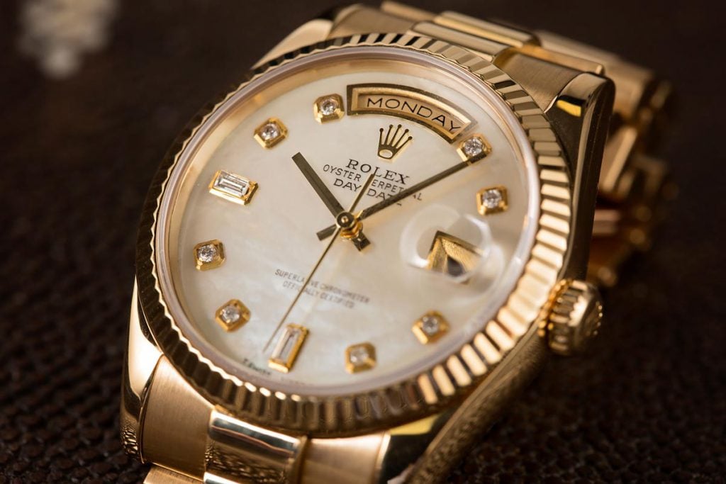 Gold Rolex Day Date with Diamonds