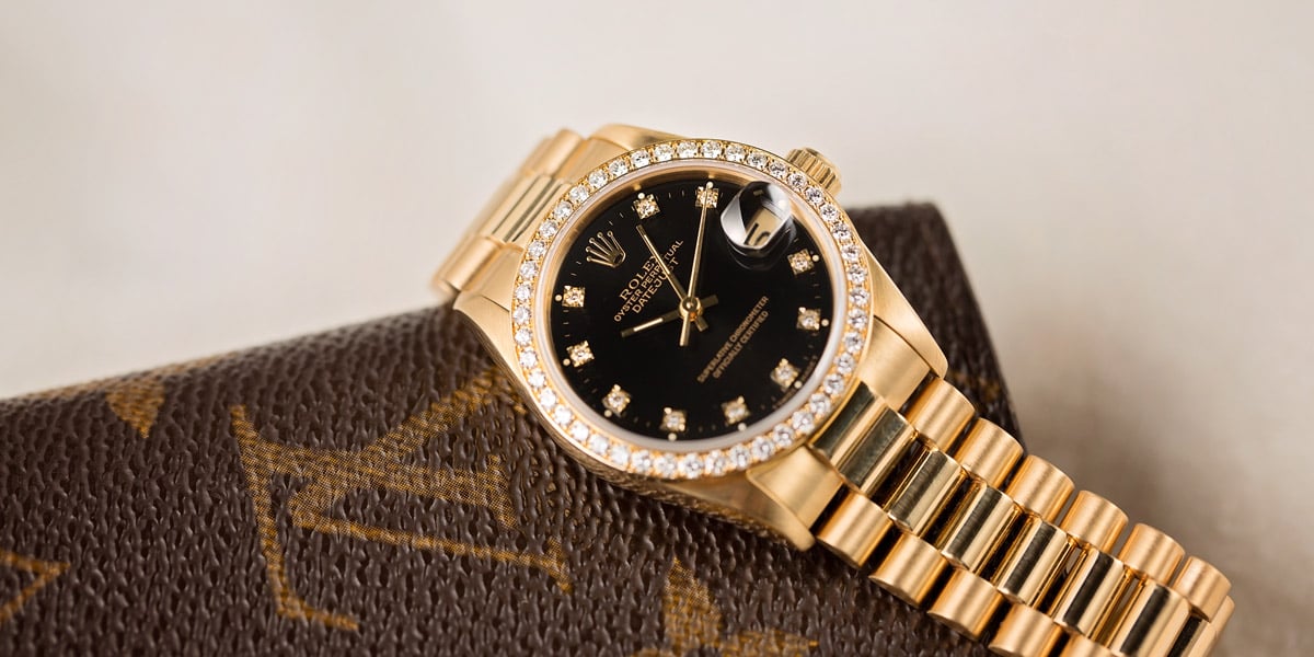 rolex gold with black face