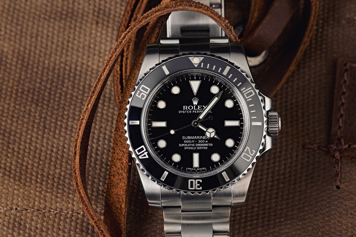 Price Guide -How Much Is a Rolex Submariner no-date? 114060 Black Dial