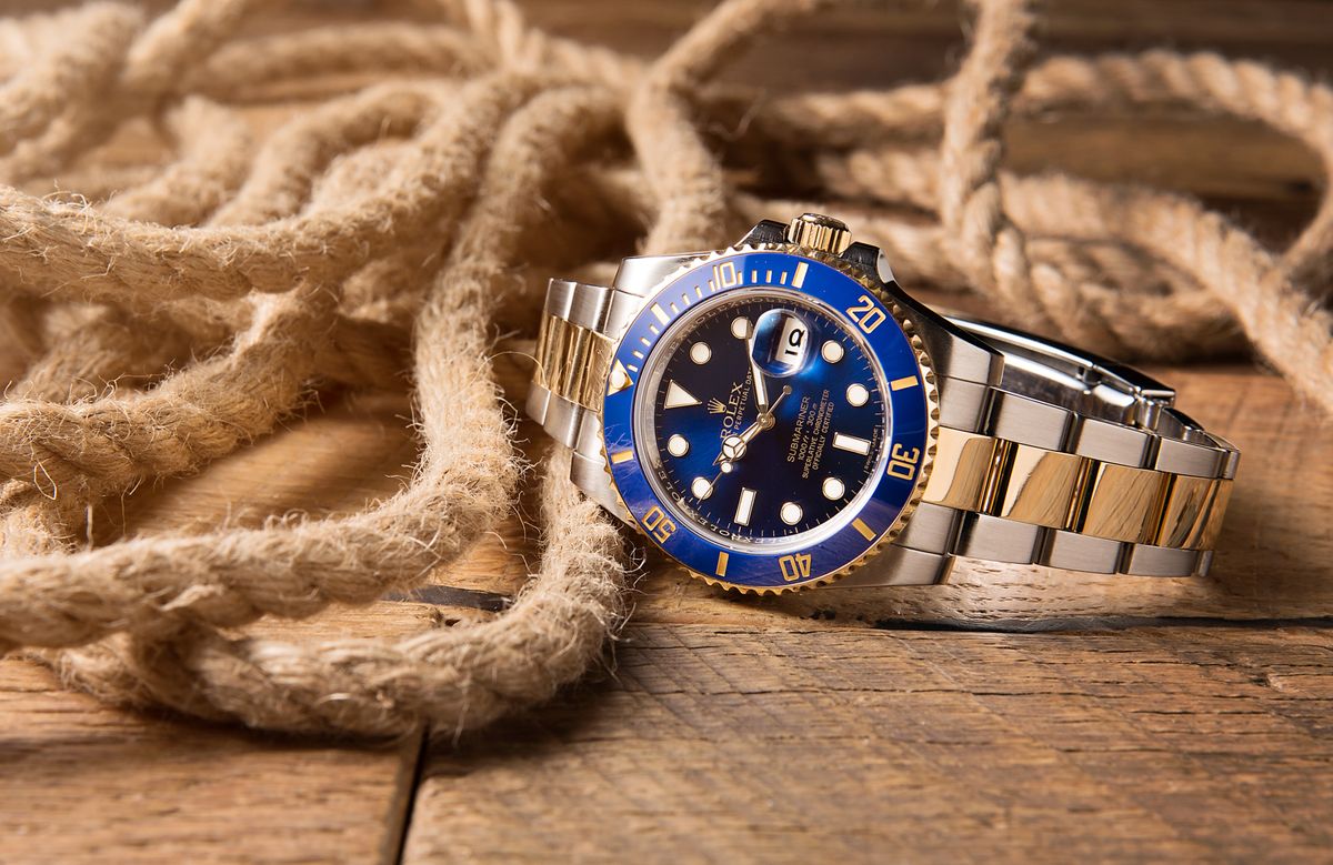 How Much Is a Rolex Submariner? Prices Guide 116613 blue steel and gold